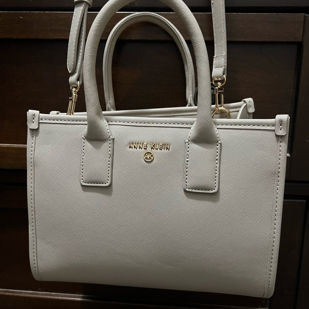 Anne Klein Saffiano Tote with extra logo strap. Color is listed as stone.
